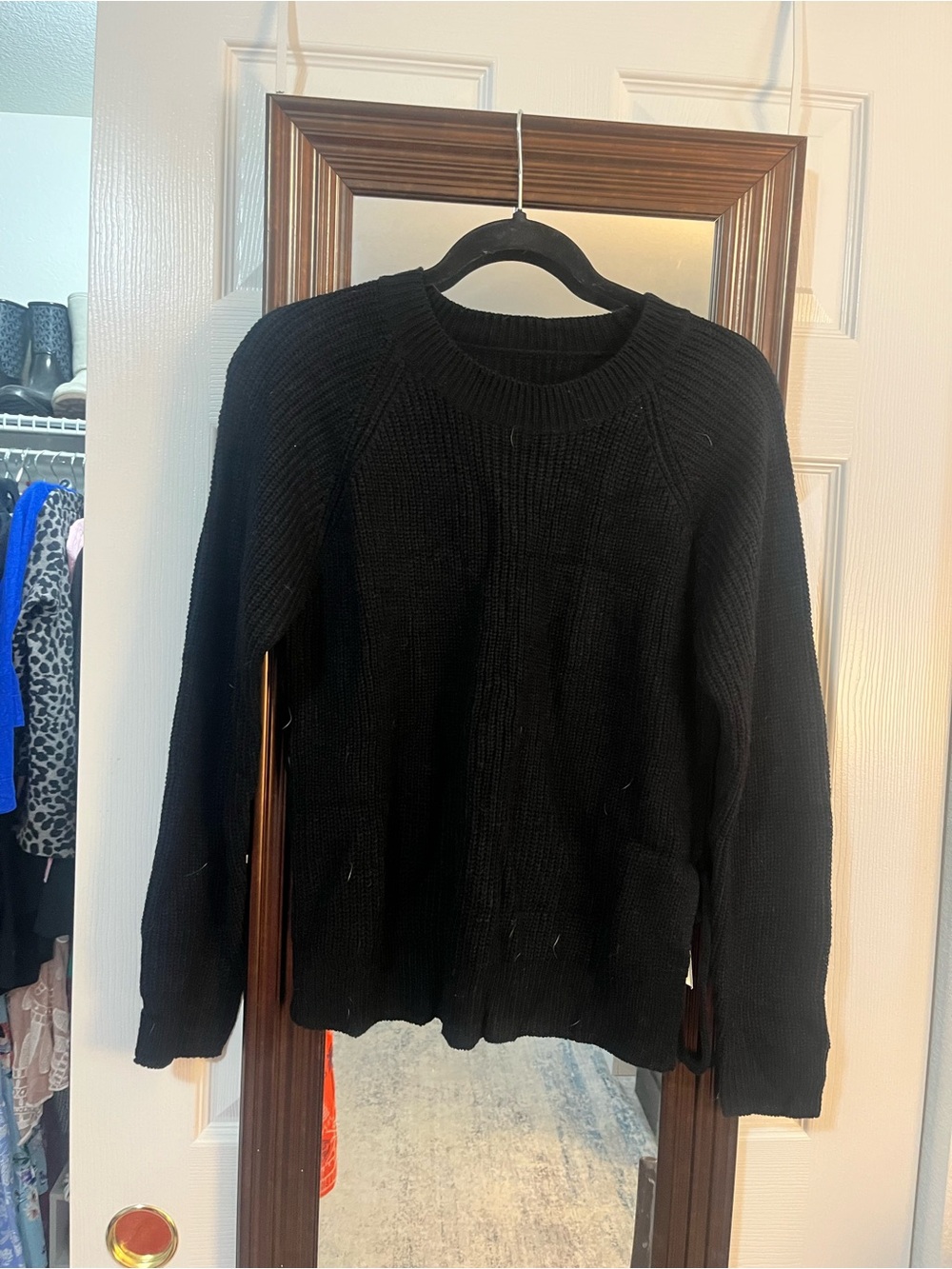 Black long knitted sleeve sweater with tie detail